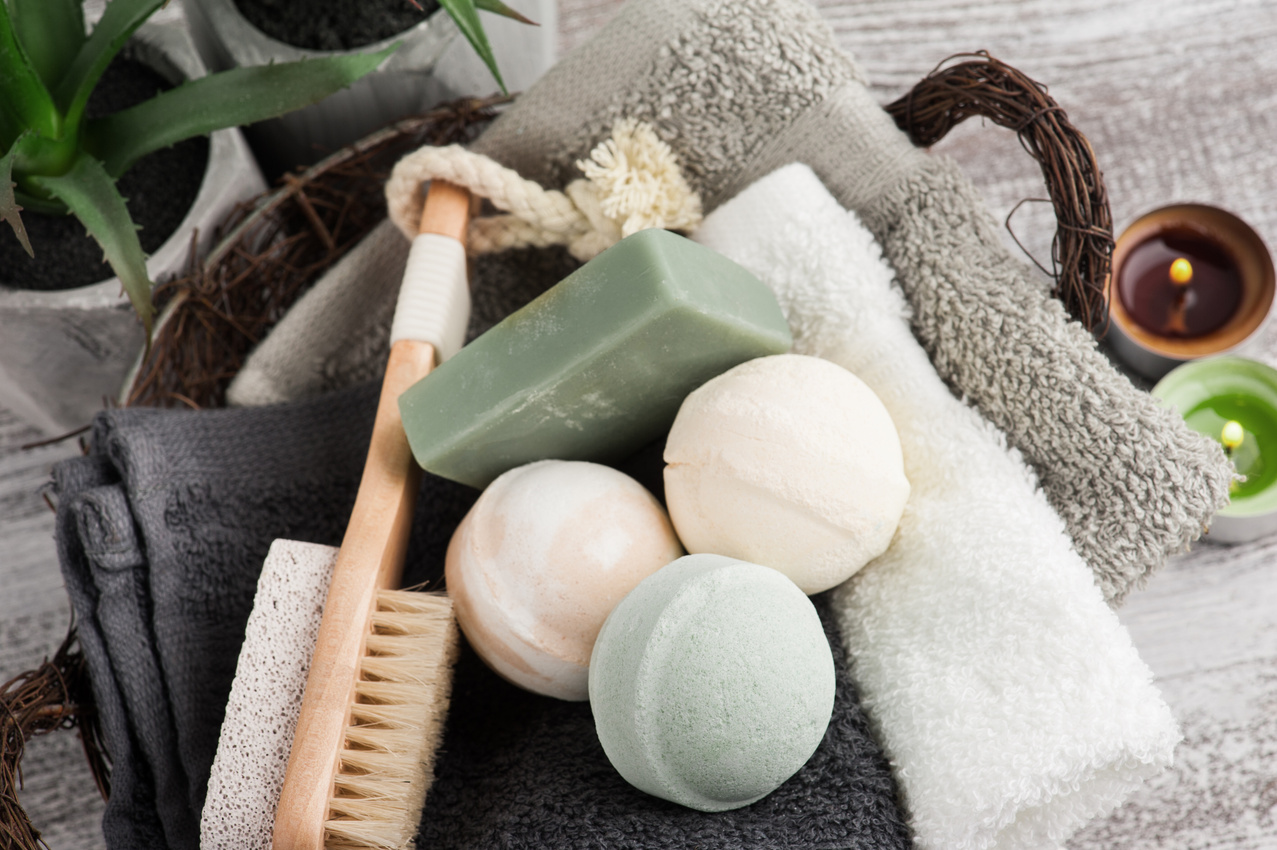 Basket of Towels With Bath Bombs and Soaps with Candles